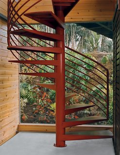 The spiral stairs were fabricated in the Bay Area and shipped in the same container as the furniture.