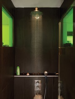 To create a sense of visual connection, Vinciguerra and Santiard set a colored window between the two rooms. They spent days making sure that the green transparency would meld nicely with the shade of green on the kitchen shelves.