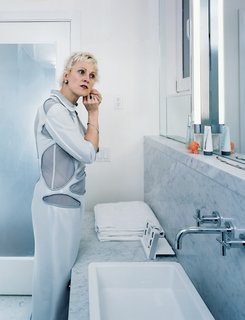Tips for Tiny Bathrooms - Photo 5 of 12 - "Because it’s a small space, it was possible to make everything pristine," says Dulkinys, standing in her dream bathroom, outfitted with full-slab Carrara marble, a Duravit sink, and fixtures by Dornbracht.