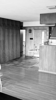 The Midcentury Spirit is Alive and Well in This Hudson Valley Escape - Photo 3 of 11 - The kitchen was formerly closed off and now flows into the living room post renovation.