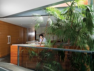 Originally built in the 1980s by architect Ray Kappe, the Manhattan Beach home of Matt Jacobson and Kristopher Dukes is anchored by a sweeping circular gesture.