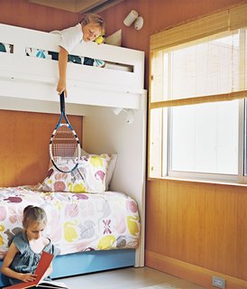 15 Modern and Creative Spaces For Kids - Photo 6 of 15 - At the Fisher family’s 1960s Long Island beach bungalow, the kids share a warm, bright space with modern prints. 