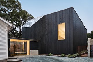 Austin residents Sam Shah and Anne Suttles chose Alterstudio to conceive a cypress-clad addition to their 1920s bungalow.