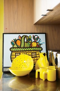 Shopping Mall Fruit Basket, a painting by Peter B. Hastings, shares space with a special-edition Royal Copenhagen tea set and a photograph by Tokyo-based artist Keith Ng.