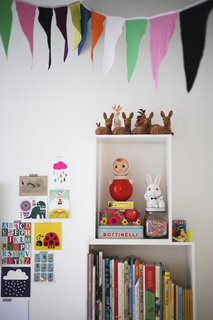 While she was pregnant and on maternity leave, Susanna tackled creative D.I.Y. projects to decorate Varpu's room, including stitching these festive cotton flag banners.