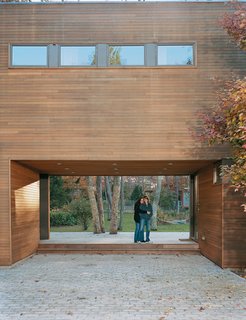 Kid Tested, Mothers Approved - Photo 1 of 8 - Tanya Wexler and Amy Zimmerman linger in the breezeway designed to draw eyes, and footsteps, from the driveway through the house to the gently sloping backyard and swimming pool beyond.