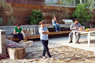 The first thing landscape designer Laura Cooper asked Devis and Purdy was to recall childhood gardens and outdoor play. In that spirit, she designed their backyard, integrating the high ground with the low just outside the "kids’ wing." The resulting series of outdoor rooms on this quarter-acre is full of memory and play.