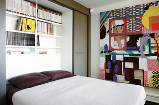 Montague’s office doubles as a guest room thanks to a Murphy bed that folds out to reveal shelves stocked with design magazines. The painting is Untitled (Corner Rainbow) by Elizabeth McIntosh.