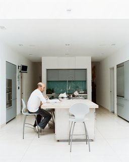 Victorian Secrets - Photo 6 of 10 - To avoid formality, Phillips created a different environment for each room. The kitchen, for example, is understated by virtue of its simple cabinetry by Boffi, and its white walls that flow with the rest of the house. "What we love about living here," says Judith, "is that it works well with our young family. There is plenty of daylight, all the latest technology, and <br><br>we don’t have to worry about sticky fingers destroying anything."