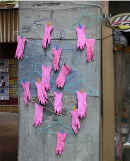 Megacity Living in Hong Kong: Architecture of Density - Photo 5 of 7 - Another detail, this one of rubber gloves hung out to dry. Photo by Michael Wolf, courtesy of the Flowers Gallery.