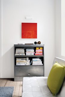 Budget-Friendly Renovation of a Neoclassical Home in Oslo - Photo 3 of 11 - In the playroom sits a 1960s-era white leather Model 67 sofa by Florence Knoll.