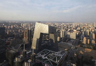 "Quake" Exhibit Explores Intersection of Architecture and Engineering - Photo 1 of 6 - The CCTV building, the headquarters of China Central Television designed by OMA, in earthquake-prone Beijing. Photo by Iwan Baan.