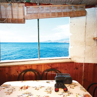 As a result of this cave dwelling on Spain's Canary Islands being so close to the seemingly endless blue water, it has a distinctly no-frills vibe—but it’s hard to argue with the view. Photo by Gunnar Knechtel.