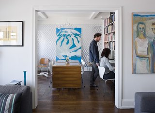 In the home office/dining room, the "Ziggy Diamond" wallpaper (behind the surreal Erle Loran painting) comes from Flavor Paper, a New Orleans firm that prints wall coverings to order, and the ingenious folding table is by Swedish designer Bruno Matthson.