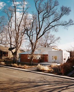 Architect Rob Pyatt's box-shaped addition is the modern kid on the block, with distinctive corrugated-metal and wide-plank cladding. Behind the facade, uncommon materials share a common story with the neighborhood: Of design decisions driven by a desire to keep the next generation—and the planet—healthy and safe.