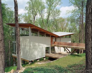 Triangle House Tours - Photo 22 of 30 - Designed by Frank Harmon this residence features deep roof overhangs shade the interior from high summer sun.