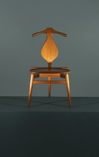 Combining the best traits of a bench and a butler, Hans Wegner’s 1953 Valet chair is the one piece of midcentury-modern furniture that the fastidiously turned-out chap overlooks at his peril. Marrying formal elegance—these handsome curves have been handcrafted in PP Møbler’s Danish workshop since it took over production in 1982—with a surprising functionalism, the Valet chair all but does away with the need for Jeeves. Initially a four-legged chair, Wegner decided to trim the final product and arrived at a tripod design, though he maintained the initial design when Danish King Frederick IX requested his own. Manufactured by PP Møbler.