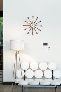 The First LEED Gold-Certified Family Home in San Diego - Photo 1 of 13 - A vintage lamp and George Nelson’s Marshmallow sofa and Spool clock <br><br>embody the mid-century feel of Soheil and Nima Nakhshab’s design for a California family home.