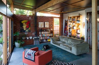 Most of the furniture in the house was purchased secondhand, or salvaged from the side of the road. Photo by Nic Granleese.