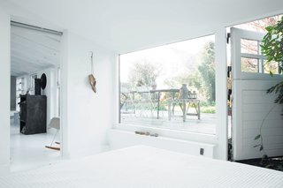 When Bjerre-Poulsen first saw the house, "I instantly saw all the interesting possibilities," he says. "As an architect you see not what it is but what it could be." Among those possibilities: transforming an adjacent storehouse into a guest room, connected to the original house via the renovated dining room and sitting area.