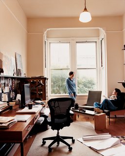 Bay Wash - Photo 8 of 9 - Her office is filled with refurbished finds and originals—–like her updated take on a ’60s-style desk and "slouch" chairs, from which she chats with her partner, Katherine Catlos.