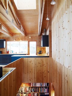 Knotty by Nature - Photo 4 of 25 - Exposed pine dominates the downstairs reception area.