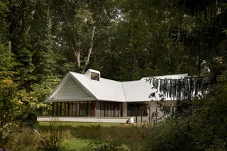 Modern Cottage Renovation in Michigan - Photo 1 of 8 -