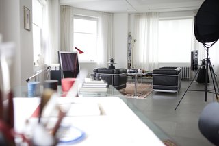 "After traveling the world, from Poland to Tel Aviv, from the Bronx to Berlin, by way of Milan and Detroit, Daniel chose New York as his home. Tribeca is just a hop and a skip from Ground Zero. His house is a refuge. Books, books and more books. Brushes for mapping new worlds. And a table, with red legs and a granite top, built when there was less history to cart about, which has followed the family throughout its lengthy journey to Manhattan." 
