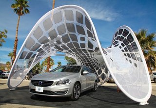 The "Pure Tension Pavilion" made its U.S. debut this weekend as part of Dwell and Volvo’s activation at the Modern Living Expo and Prefab Showcase. Designed by Alvin Huang, this a free-standing tensioned membrane structure is a rapidly deployable and portable solar charging station designed to power up the Volvo V60 Plug-in Hybrid, the world’s first Diesel Plug-in Hybrid.