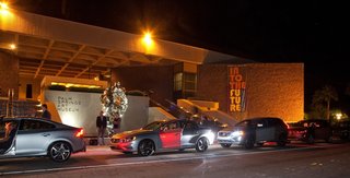 Volvos with the new adaptive cruise control technology (ACC) lined up in front of the Palm Springs Art Museum to chauffeur guests to dinner.