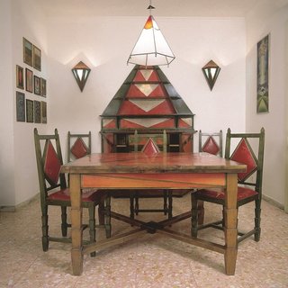 The Cimino Home Dining Room Set (Sala da pranzo di casa Cimino) by Gerardo Dottori from the early 1930s.Table, chairs, buffet, lamp, and sideboard; wood, glass, crystal, copper with chrome plating, leather, dimensions variable. Private collection © 2014 Artists Rights Society (ARS), New York / SIAE, Rome the Peggy Guggenheim Collection, Venice Photo: Daniele Paparelli, courtesy Archivi Gerardo Dottori, Perugia, Italy