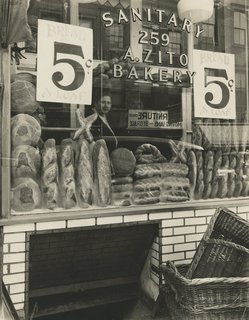 Street Photography of New York and Paris's Ghostly Past - Photo 1 of 10 - Berenice Abbott. Bread Store, 259 Bleecker Street, Manhattan, February 3, 1937 Gelatin silver print; printed c.1937