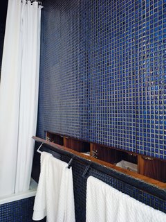 Even the laundry hampers, above, are discreetly stowed out of sight.