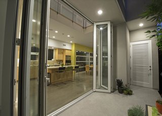 Another view of the kitchen, which features engineered quartz countertops. Photo by Ken Pagliaro Photography.