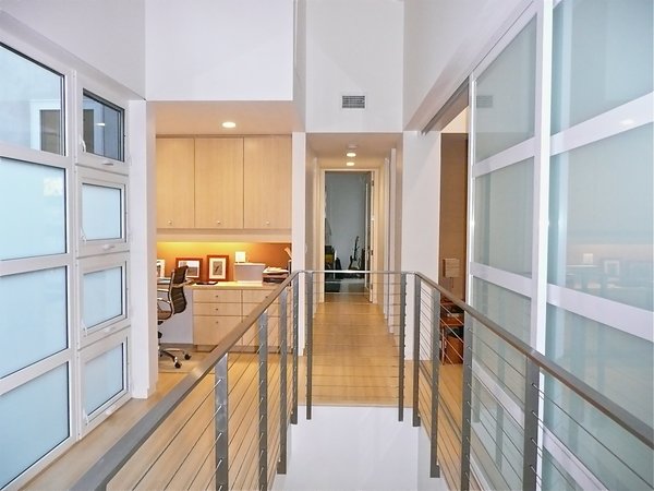 A Sustainable "Case Study" House in California - Photo 6 of 8 - Another view of the upstairs hallway, which features bamboo flooring. Photo by Ken Pagliaro Photography.