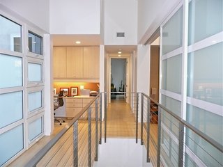 Another view of the upstairs hallway, which features bamboo flooring. Photo by Ken Pagliaro Photography.