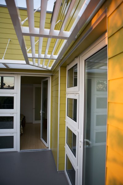 A Sustainable "Case Study" House in California - Photo 8 of 8 - Lap siding, a brise-soleil awning and white accents are reference the architectural vernacular of this coastal part of Southern California. Photo by Ken Pagliaro Photography.