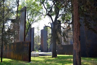 10 Inspiring Modern Memorials - Photo 10 of 10 - 10. Memorial to Victims of Violence in Mexico (Mexico City, Mexico): Designed by Gaeta Springall Arquitectos<br><br>This array of 70 steel slabs may not be the most inviting setup at first glance, but it’s actually a massive interactive display; visitors can etch their own stories into these massive pieces of metal, creating a constantly changing repository of stories.