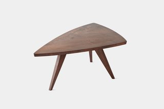 Splay-Leg Table<br><br>Impressed by the simple elegance and understated forms of his work, Hans and Florence Knoll added Nakashima’s work to their roster. This table was designed in 1946 with a low-sheen finish and live grain patterns. Photo courtesy George Nakashima Woodworker, S.A.