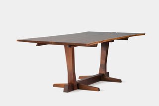 Conoid Table<br><br>Pieces from this series, named after Nakashima’s Conoid workshop, which he opened in 1957, focus on free-edge forms, respecting and conforming to the natural shape of the wood, and often employ cantilever technology. Photo courtesy George Nakashima Woodworker, S.A.
