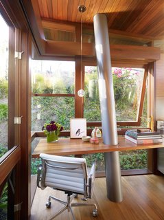 An Atypical Tree House - Photo 7 of 11 - Materials and craft play a significant role inside and out. The columns are Type 316 stainless steel – almost nautical grade. Floors and walls are walnut; windows are mahogany.