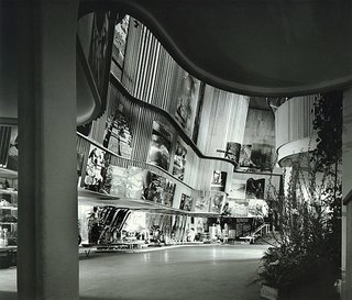 Design Icon: 10 Buildings By Alvar Aalto - Photo 2 of 11 - Finnish Pavilion at the 1939 World’s Fair (New York, USA: 1939)<br><br>It’s fitting that a man often called one of Finland’s greatest architects would cap his most successful decade of work with a structure that celebrated his country’s contributions to the world. Within the compact, four-story structure, photos of landscapes, people and products looked out over curvaceous, wood-slatted walls, a flowchart of Finnish industry capped off by airplane propellers spinning like fans from the ceiling.