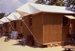 Paper Log House (Kobe, Japan: 1995)<br><br>These 16-square-meter structures elegantly proved Ban’s cardboard concept; tubing could be used as load-bearing structures, and could be made both waterproof and flame-resistant. Beer crates were used for support. Ban supposedly picked Kirin because the label colors were a better match. This design has since been used for disaster relief in India and Turkey.<br><br>Credit: Forgemind Archimedia, Creative Commons