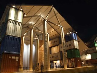 Nomadic Museum (New York, USA: 2005)<br><br>Constructed from shipping containers, this temporary art housing has become a traveling exhibit; the paper tubes are packed up in between showings in a spare shipping container, moved to the next city, and then used to set up shop with rented containers from that area. It was first used to house the 'Ashes and Snow' photography and film exhibition by Gregory Colbert at the West Piers in Manhattan.
