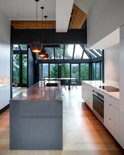 20 Dream Kitchens - Photo 14 of 20 - The residents collaborated with the architects to achieve the sharp graphic sensibility they desired. Part way through the project, they realized the space would be more compelling in muted tones.