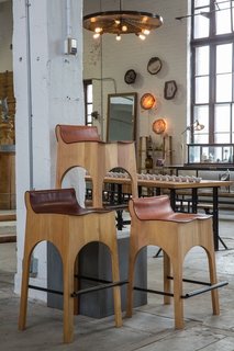 Philadelphia Design Hub: American Street Showroom - Photo 8 of 11 - One of our favorite finds at the showroom, custom leather and wood barstools.