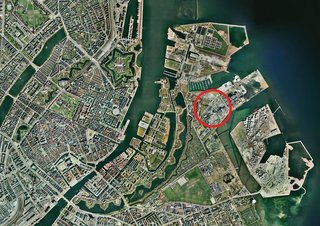 At 260 feet, the Amager Bakke incinerator will be one of the tallest buildings in Copenhagen when it is completed. This rendering shows its location in an industrial area near the city's waterfront. Image courtesy of the Bjarke Ingels Group.