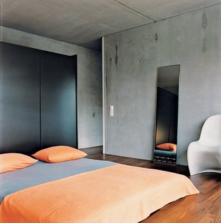 The master bedroom is spartan.