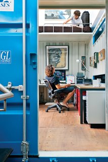 In his home office, Wardell runs his online art gallery Chester's Blacksmith Shop and researches his next project: opening a boutique hotel in New Zealand. His nephew peeks down from the "napping nook" secreted above the office. The desk is from Room & Board.