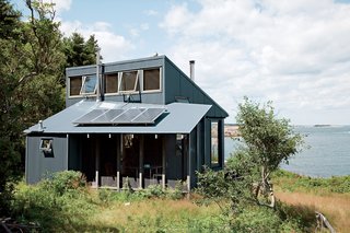Solar panels power this 550-square-foot Maine cottage designed by Alex Scott Porter. 
